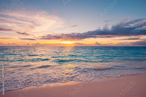 Fototapeta Naklejka Na Ścianę i Meble -  Closeup sea sand beach. Perfect beach landscape. Inspire tropical empty seascape horizon. Colorful vibrant sunset sky. Calm tranquil relax amazing sunlight, summer vacation travel holiday wallpaper