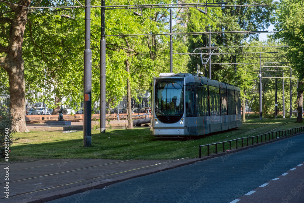 Tram in Rotterdam city, public transportation, sunny day in Netherlands Holland