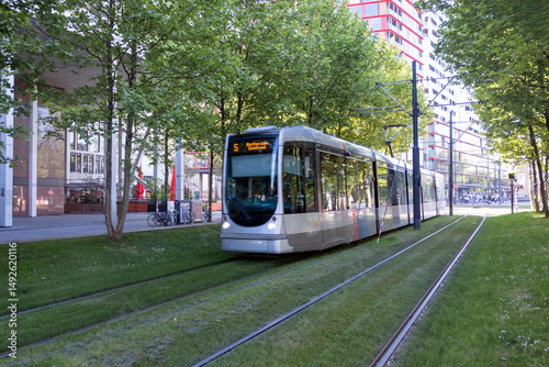 Obraz na płótnie Tram in Rotterdam city, public transportation, sunny day in Netherlands Holland w salonie