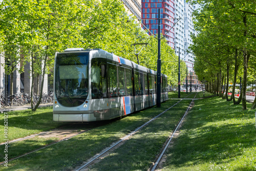 Obraz na płótnie Tram in Rotterdam city, public transportation, sunny day in Netherlands Holland w salonie