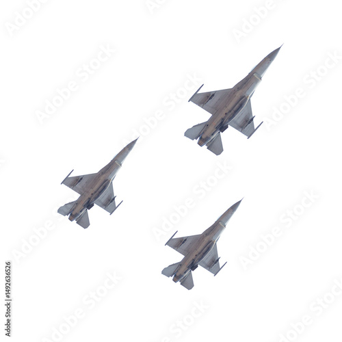 A flock of three fighter jets flying in the sky, isolated on white background.