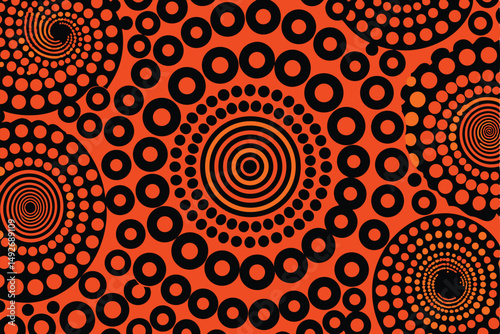 Dynamic abstract design with black circular shapes and orange background suitable for various projects