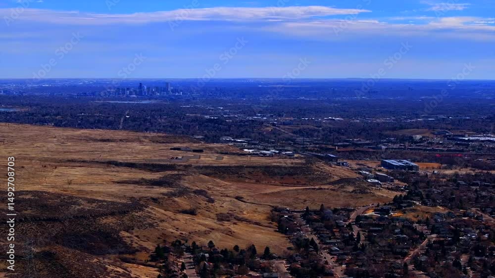 Lookout Mountain Golden Colorado aerial drone Downtown Denver cityscape from North Table Mesa daytime winter sunny clouds neighborhood Front Range Rocky Mountains Arvada Lakewood circle right motion Lookout Mountain Golden Colorado aerial drone Downtown Denver cityscape from North Table Mesa daytime winter sunny clouds neighborhood Front Range Rocky Mountains Arvada Lakewood circle right motion
