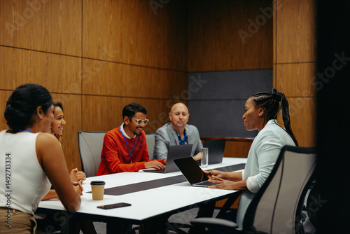 Diverse team engaged in a corporate business meeting