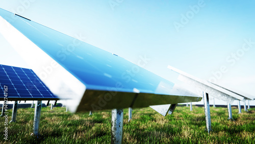 Solar panels are converting sunlight into green energy in an open field with a clear blue sky
