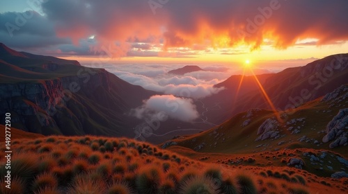 A panoramic view of Bufones de Pria in Spain at dawn, with dramatic clouds over the coastal cliffs.
