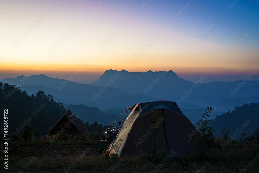 Obraz premium Beautiful landscape of sunrise at Doi Luang Chiang Dao Mountain Peak viewpoint in the National Park has and important ecosystem. It is the second-highest mountain in Chiang Mai, Thailand.
