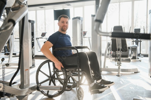 Wallpaper Mural Man with disability training in wheelchair at gym for rehabilitation Torontodigital.ca