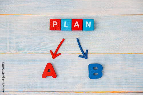 Red and blue wooden blocks with the words Plan A and B