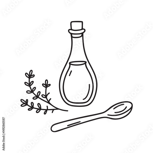 A thyme sprig beside an olive oil bottle and spoon