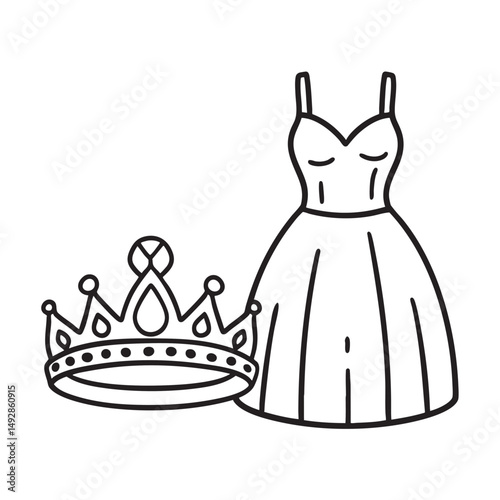 A tiara lying beside a of a gown on paper