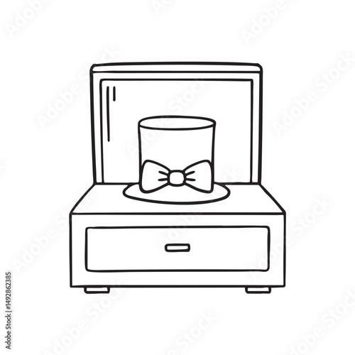 A tie bow inside a top hat on an opened dresser