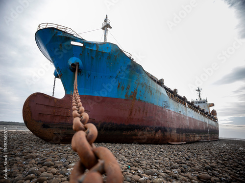 Принти на полотні A cargo ship ran aground on the coast after a typhoon