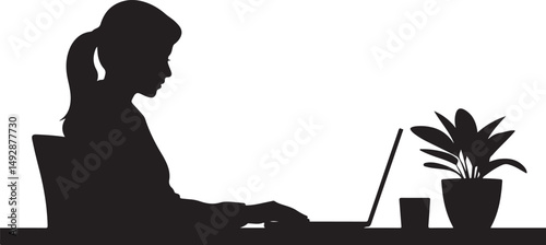Silhouette of Woman Working on Laptop at Desk