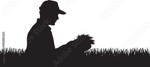 Silhouette of Farmer Examining Crops in Grass