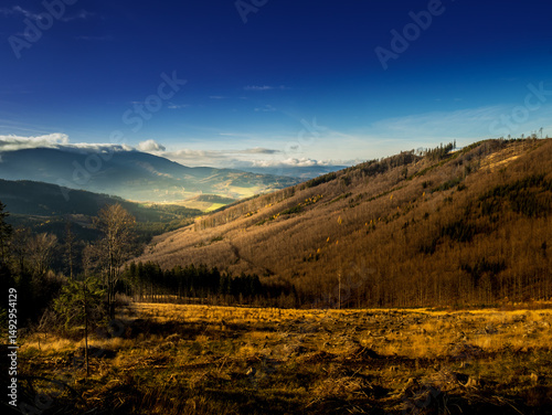 View from a hill on a scenic autumn landscape of Jeseniky mountains, Czech_Republic.