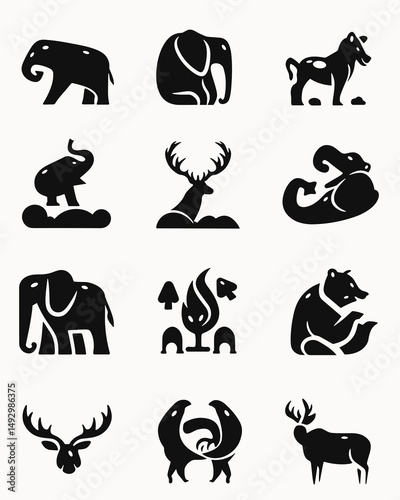 Animal Icons: A collection of 12 simple, stylized animal icons - elephant, wolf, bear, and deer - perfect for minimalist designs or branding. Each icon is vectorized and comes in a simple.