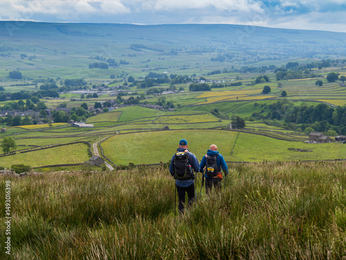 Hikers Overlooking Verdant Valley