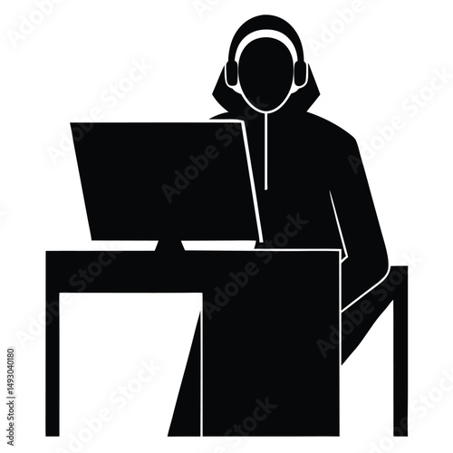 Person Wearing Headphones Using Desktop Computer