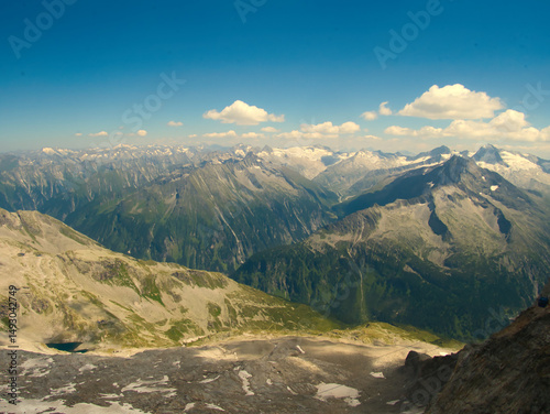 View on jagged mountains and glaciers of Zillertal alps on a summer day