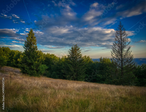 View from mountain range in the Beskydy mountains on a summer evening