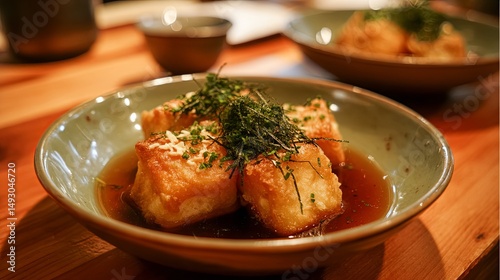 Crispy Agedashi Tofu in Dashi Broth - Traditional Japanese Dish photo