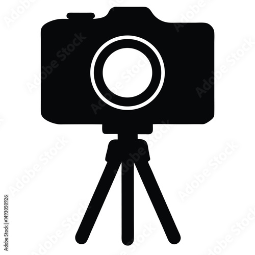 Black silhouette of a camera on a tripod for stability capturing images