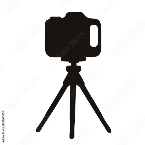 Silhouette of camera on tripod ready for photography and videography