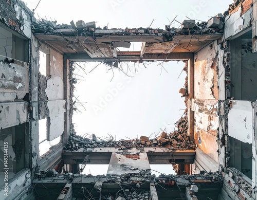 Interior view of a demolished building exposing open sky