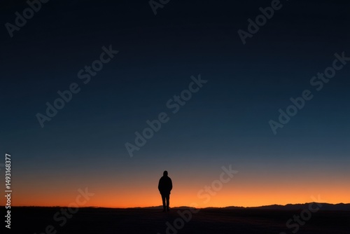Silhouette of Man Walking Towards Horizon at Sunset, Showcasing Personal Journey and Solitude : Generative AI