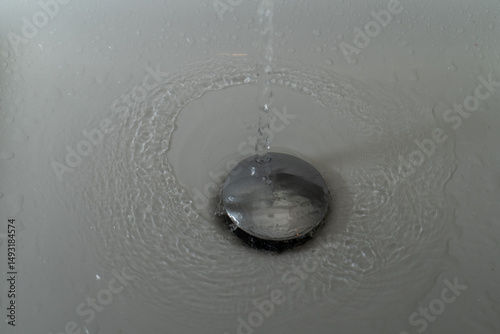 Close up of splashing water from a fountain or shower head