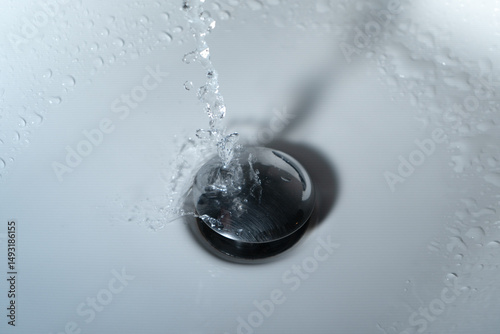 Close up of splashing water from a fountain or shower head