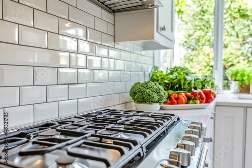 Modern Kitchen Setup Featuring Gas Stove, Fresh Vegetables, and Bright Natural Light Enhancing the Inviting Culinary Space for Cooking Enthusiasts