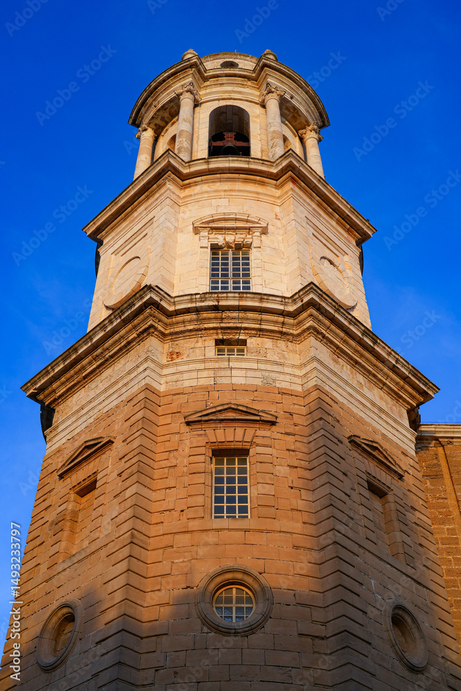 Fototapeta premium Bell tower of the Cathedral of the Holy Cross over the Waters aka the Cádiz Cathedral in Andalusia, Southern Spain