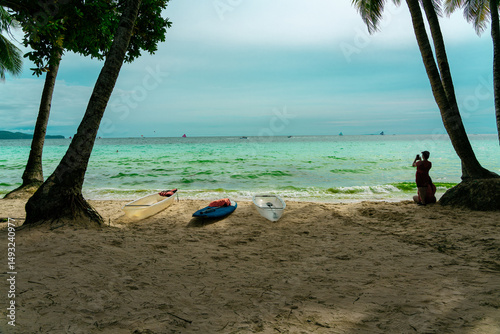 Fototapeta Naklejka Na Ścianę i Meble -  sea, sun and sand. White sand beach with blue water, white sand and palm trees. Summer vacation vibes. Beaches in asia.