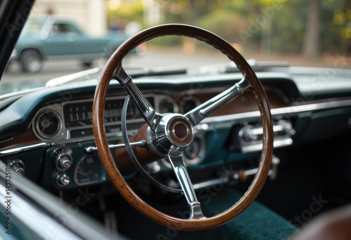 Classic vintage car interior with a wooden steering wheel and dashboard