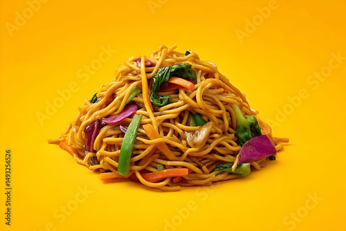 Vibrant pile of stir-fried noodles and vegetables.