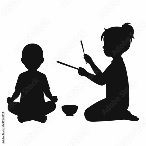 Silhouette of children playing with chopsticks and bowl