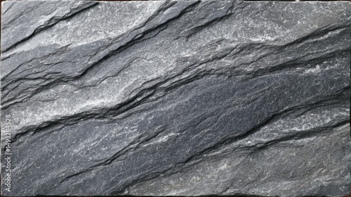 Overhead view of polished slate slab with parallel graphite veins forming minimal and elegant linear patterns. Natural stone texture with monochrome color and clean geometric alignment.