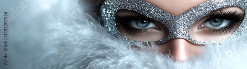 Close-up of a woman wearing a silver mask