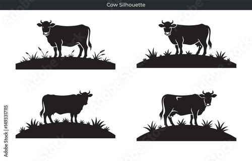 Four elegant black cow silhouettes standing gracefully on a small hill of grass