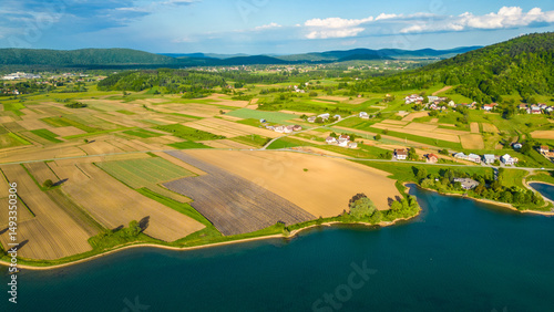 Scenic aerial view of lake (Jezero) Sabljaci near Ogulin, Croatia – a peaceful reservoir surrounded by forests and hills, perfect for outdoor activities and nature lovers photo