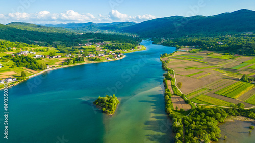 Scenic aerial view of lake (Jezero) Sabljaci near Ogulin, Croatia – a peaceful reservoir surrounded by forests and hills, perfect for outdoor activities and nature lovers photo