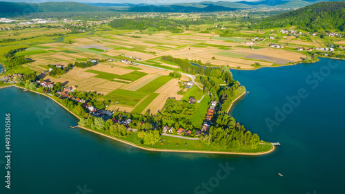 Scenic aerial view of lake (Jezero) Sabljaci near Ogulin, Croatia – a peaceful reservoir surrounded by forests and hills, perfect for outdoor activities and nature lovers photo