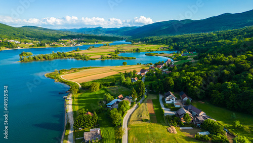 Scenic aerial view of lake (Jezero) Sabljaci near Ogulin, Croatia – a peaceful reservoir surrounded by forests and hills, perfect for outdoor activities and nature lovers photo