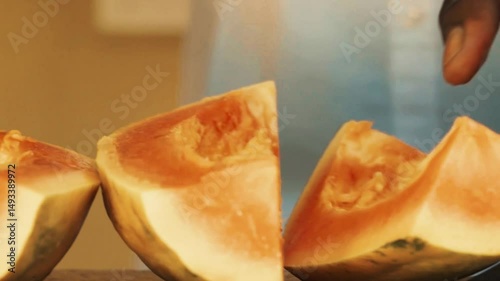 Senegalese Bartender Craft: Macro Close-up of African Hands Slicing Fresh Papayas with Knife, Exotic Fruit Preparation on Bar Counter for Juices Cocktails