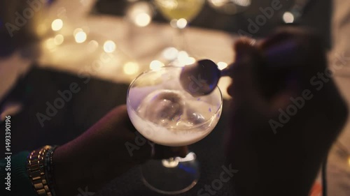 Artistic Ice Cream Dessert Close-up in Senegal: African Hands Mixing Gourmet Sweet Treat on Decorated Table, Shallow Depth of Field, Fine Dining