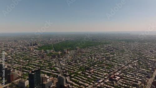 Cinematic drone footage over Grand Army Plaza and the entrance to Prospect Park in Brooklyn, New York. Captured in May daylight, the video features the iconic Soldiers’ and Sailors’ Arch, circular tra photo