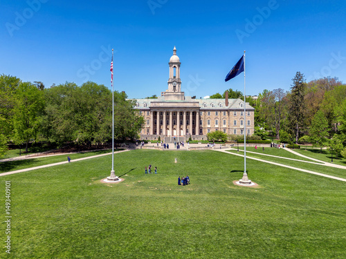 The Old Main building in the campus of Penn State University aerial view in spring sunny day, State College, Pennsylvania. photo