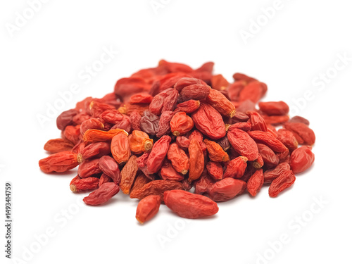 A wolfberry (goji berry) pile isolated on white background dried form rich red orange